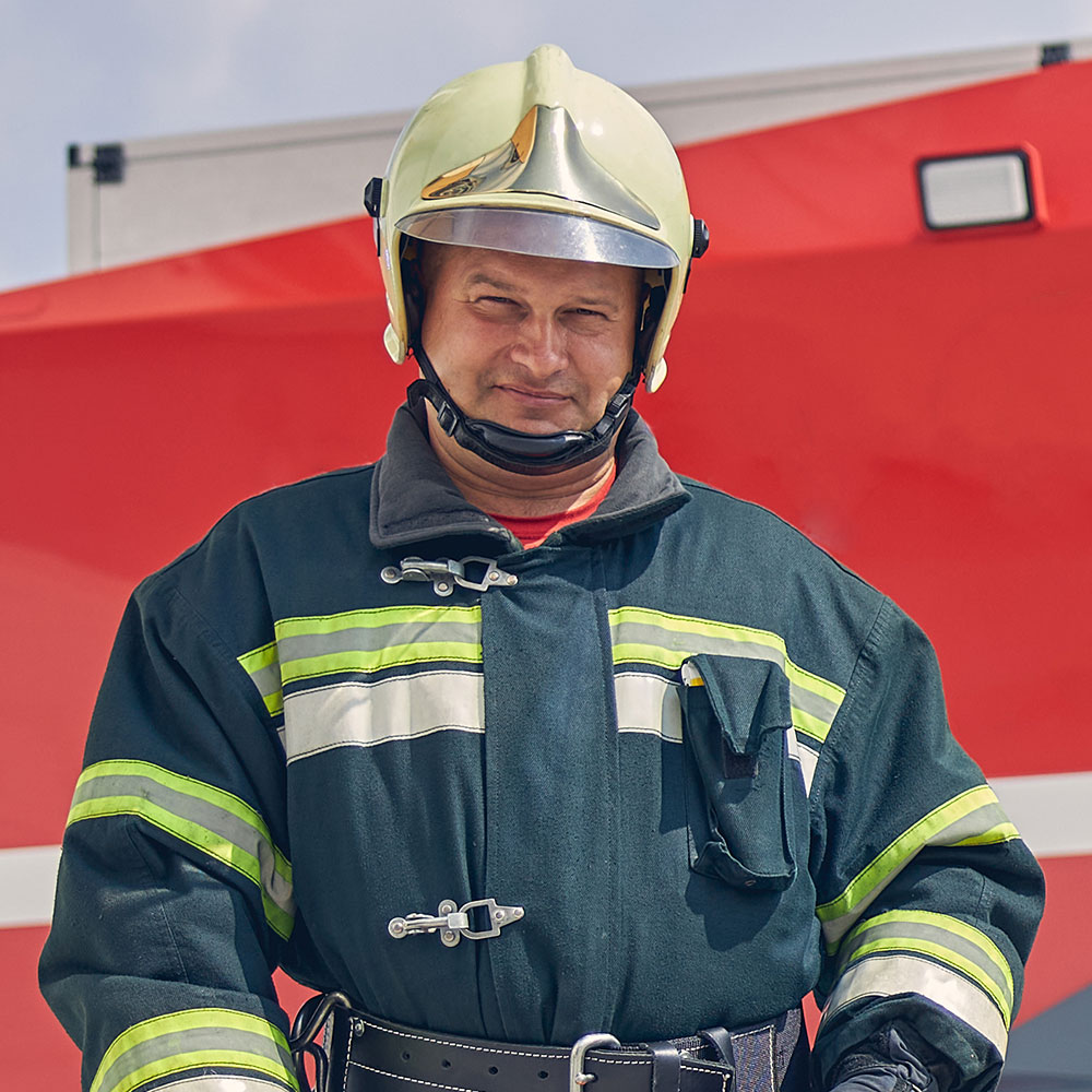 strong-firefighters-standing-near-the-fir-3KPMY7N.jpg
